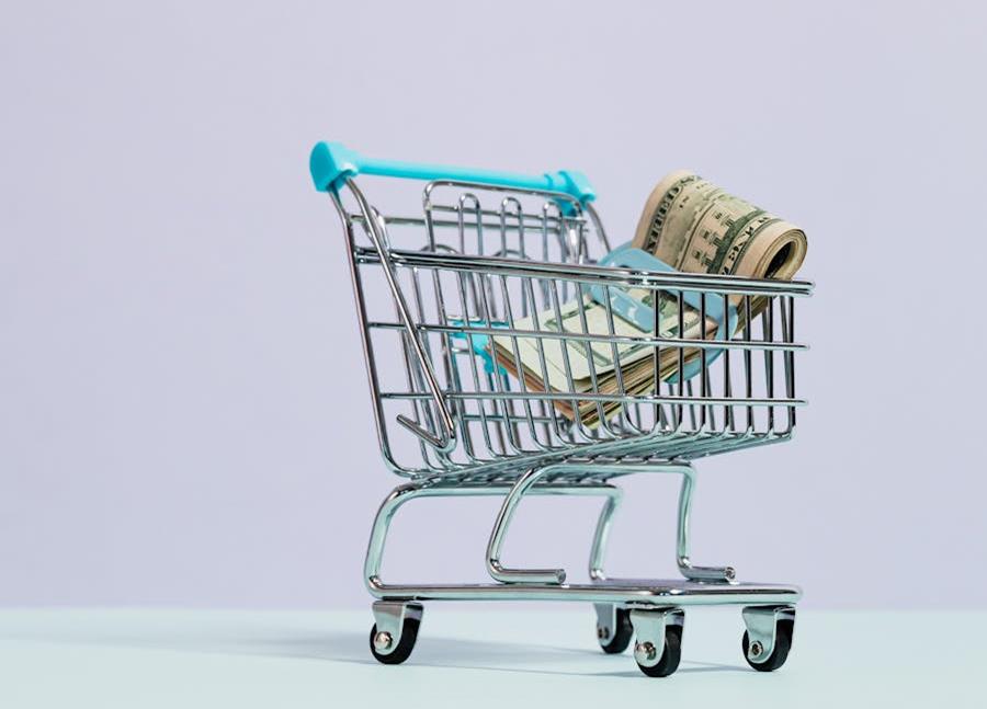 Shopping trolley full of cash