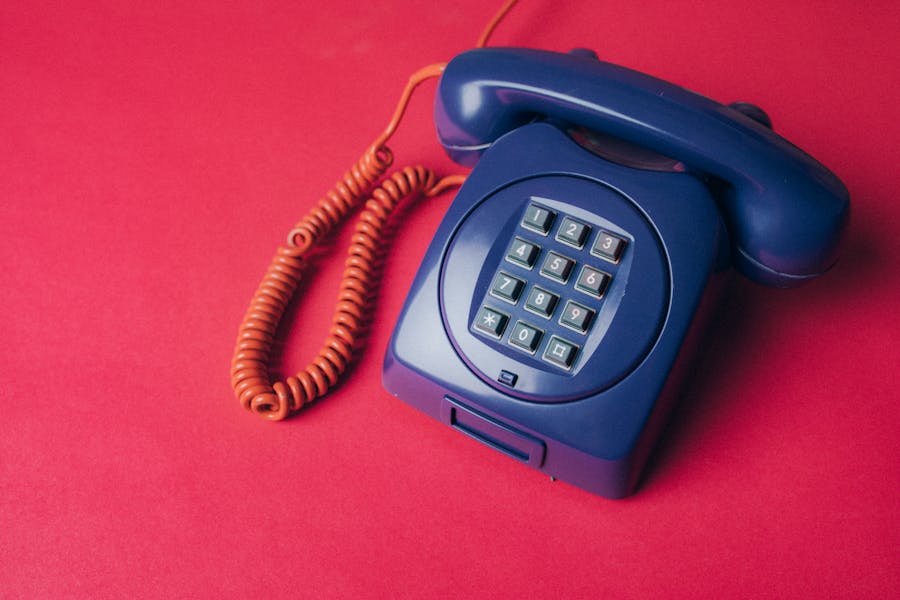 Blue phone on red background