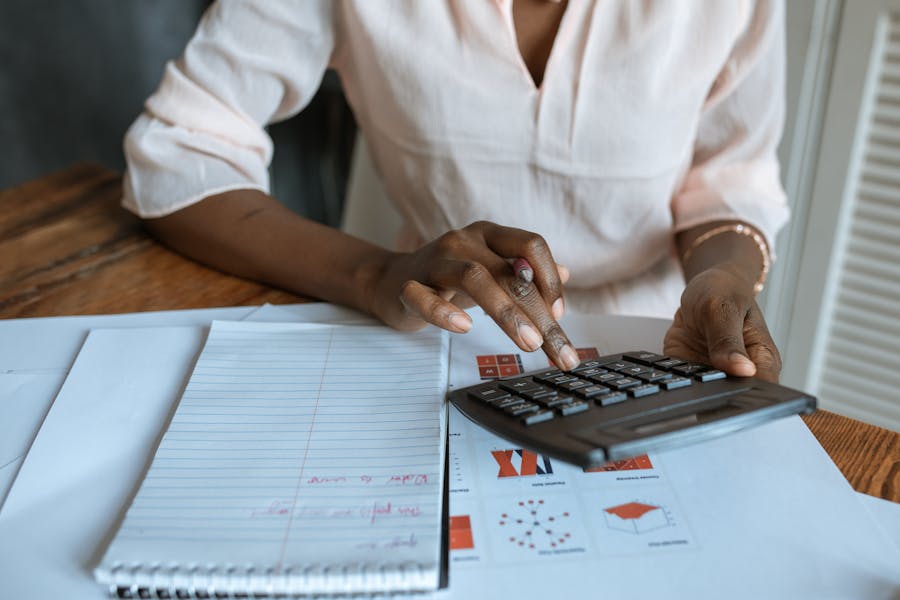 Woman using a calculator