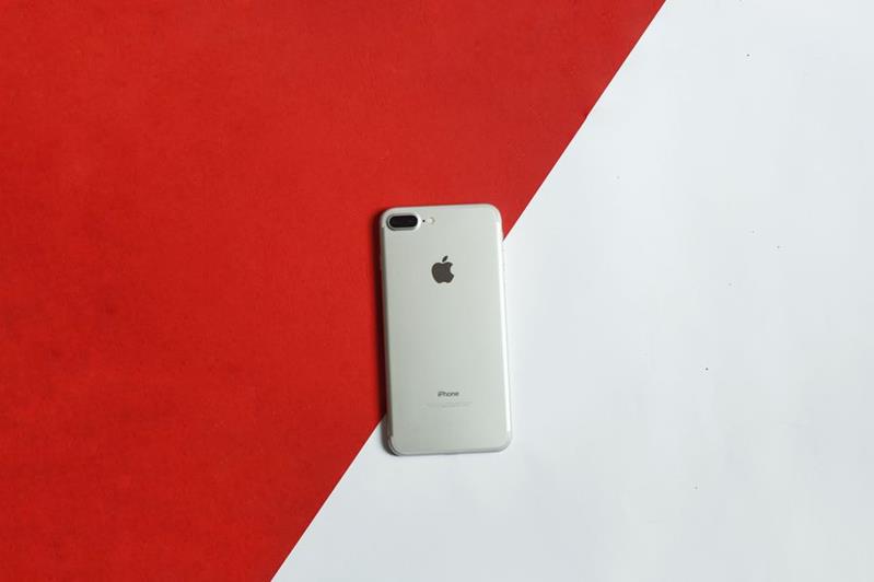 iPhone on red and white background